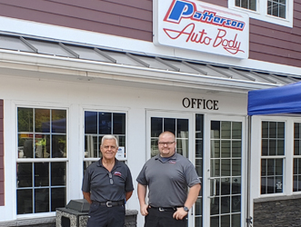 two-men-outside-body-shop