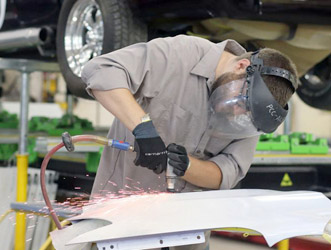 man-working-on-car