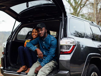 people-sitting-in-back-of-suv